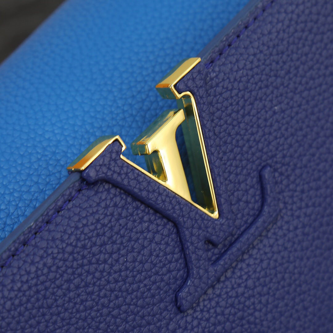 Louis Vuitton Capucines bb Blue Pebbled Leather Bag 27x18x10cm | Celebrity Street Style, Detachable Strap & Twist Lock