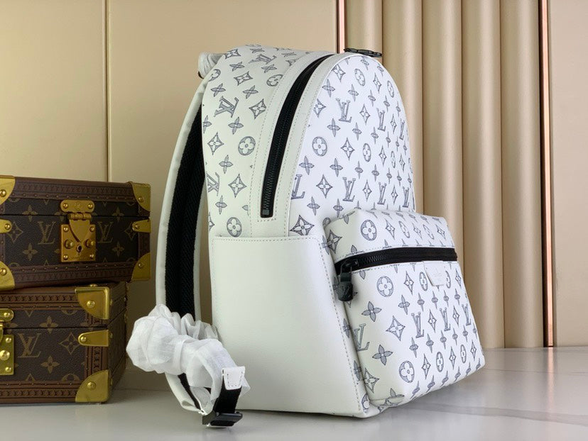 LOUIS VUITTON Discovery Backpack | Navy Blue Monogram Shadow Leather with Embossed LV Initials & Flowers