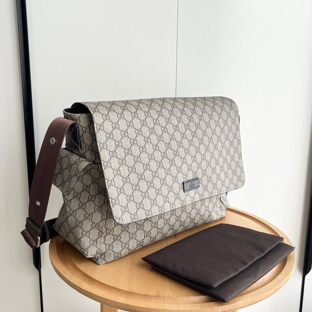 Gucci Luxury Diaper Bag – 44×28×14cm Spacious Tote with Side Pockets Foldable Mat & Adjustable Strap Unisex Design