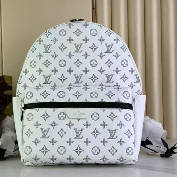 LOUIS VUITTON Discovery Backpack | Navy Blue Monogram Shadow Leather with Embossed LV Initials & Flowers