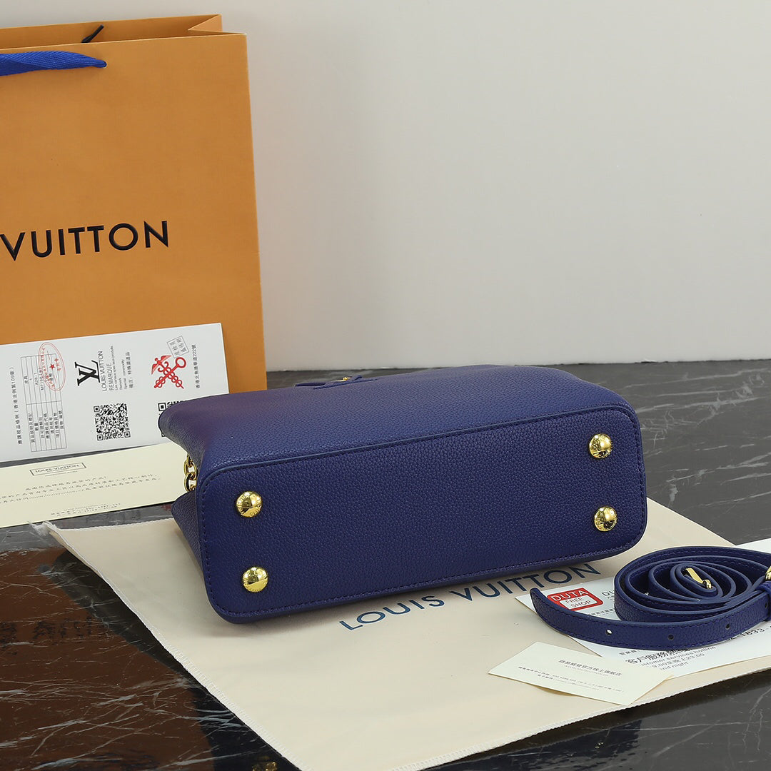 Louis Vuitton Capucines bb Blue Pebbled Leather Bag 27x18x10cm | Celebrity Street Style, Detachable Strap & Twist Lock