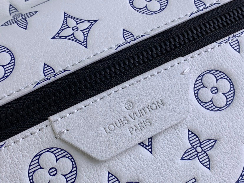 LOUIS VUITTON Discovery Backpack | Navy Blue Monogram Shadow Leather with Embossed LV Initials & Flowers