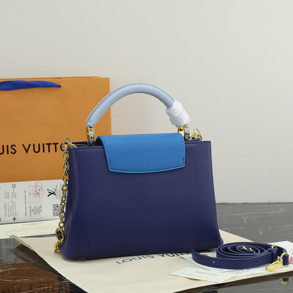 Louis Vuitton Capucines bb Blue Pebbled Leather Bag 27x18x10cm | Celebrity Street Style, Detachable Strap & Twist Lock