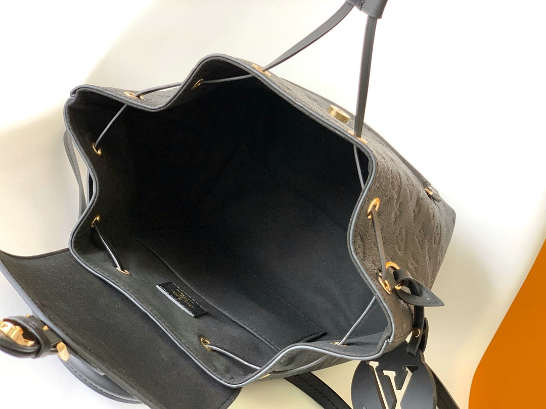 Louis Vuitton Montsouris 1994 Re-Edition Backpack | Monogram Empreinte Embossed Leather | Vintage Metal Buckle | Adjustable Strap