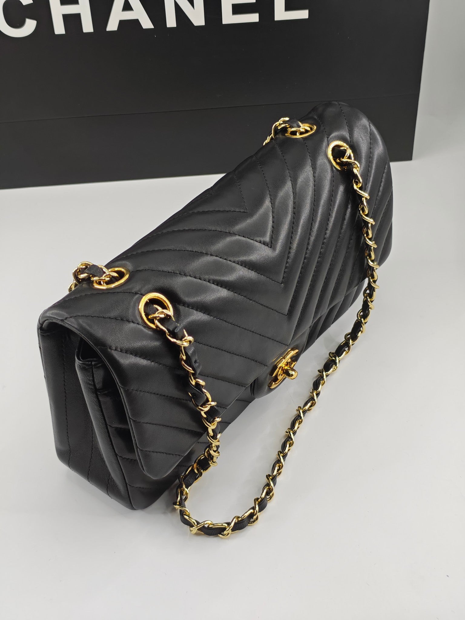 Chanel CF1112 Classic Black Gold Lambskin Bag | Stamped Chip Edition | 24K Gold Plated Hardware | Luxury Choice for Gatherings