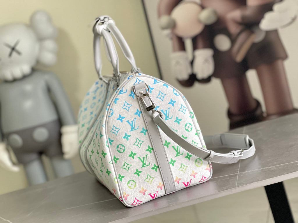 Louis Vuitton KEEPALL BANDOULIÈRE 55 Travel Bag | Vintage Monogram Canvas | FW21-22 Runway Capsule | Storefront Signage Design