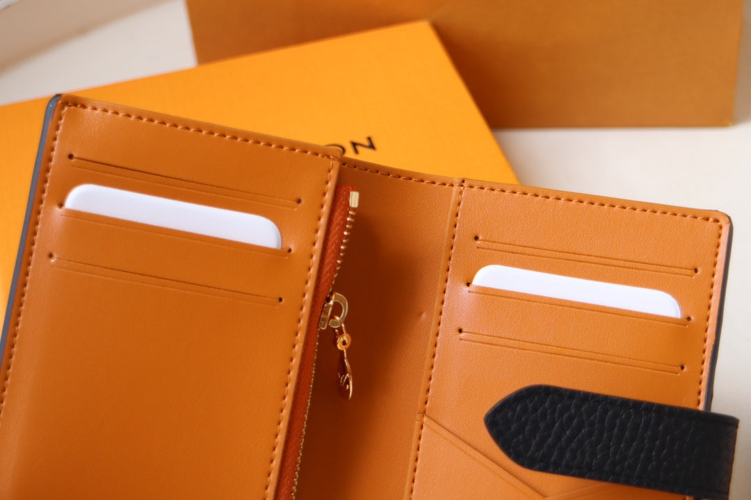 Louis Vuitton LV Vertical Compact Wallet | Grained Taurillon Leather | Capucines-Inspired Slide Lock | Multi-Card Organizer