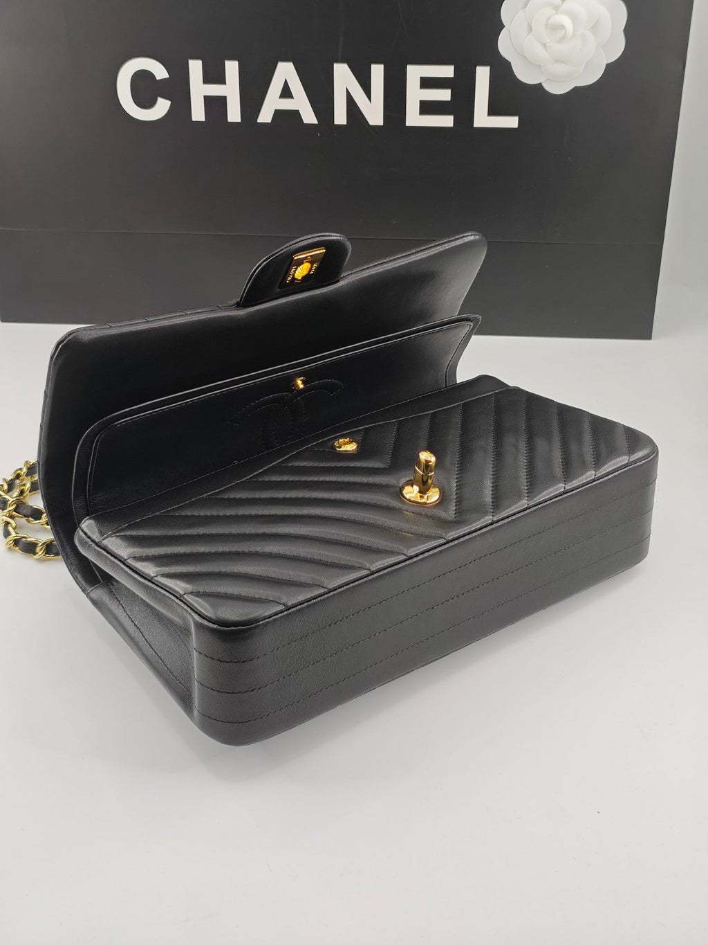 Chanel CF1112 Classic Black Gold Lambskin Bag | Stamped Chip Edition | 24K Gold Plated Hardware | Luxury Choice for Gatherings