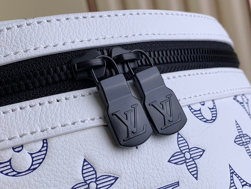 LOUIS VUITTON Discovery Backpack | Navy Blue Monogram Shadow Leather with Embossed LV Initials & Flowers
