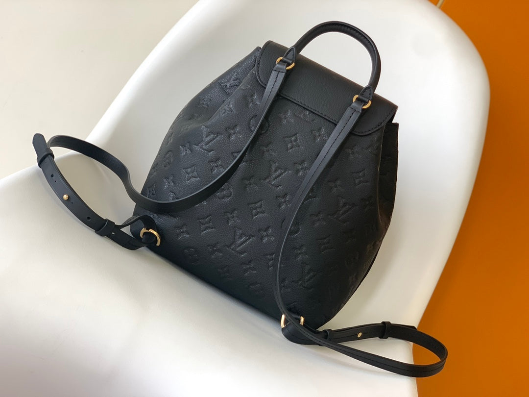 Louis Vuitton Montsouris 1994 Re-Edition Backpack | Monogram Empreinte Embossed Leather | Vintage Metal Buckle | Adjustable Strap