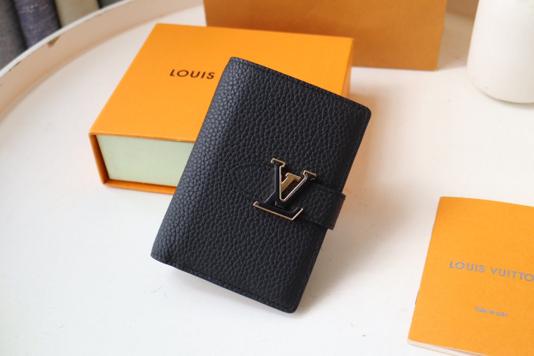 Louis Vuitton LV Vertical Compact Wallet | Grained Taurillon Leather | Capucines-Inspired Slide Lock | Multi-Card Organizer