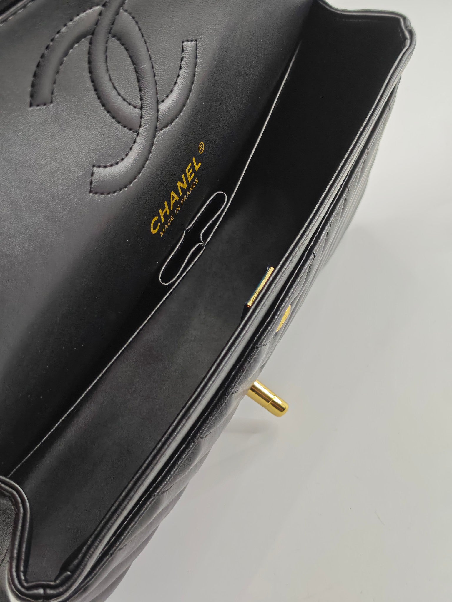 Chanel CF1112 Classic Black Gold Lambskin Bag | Stamped Chip Edition | 24K Gold Plated Hardware | Luxury Choice for Gatherings