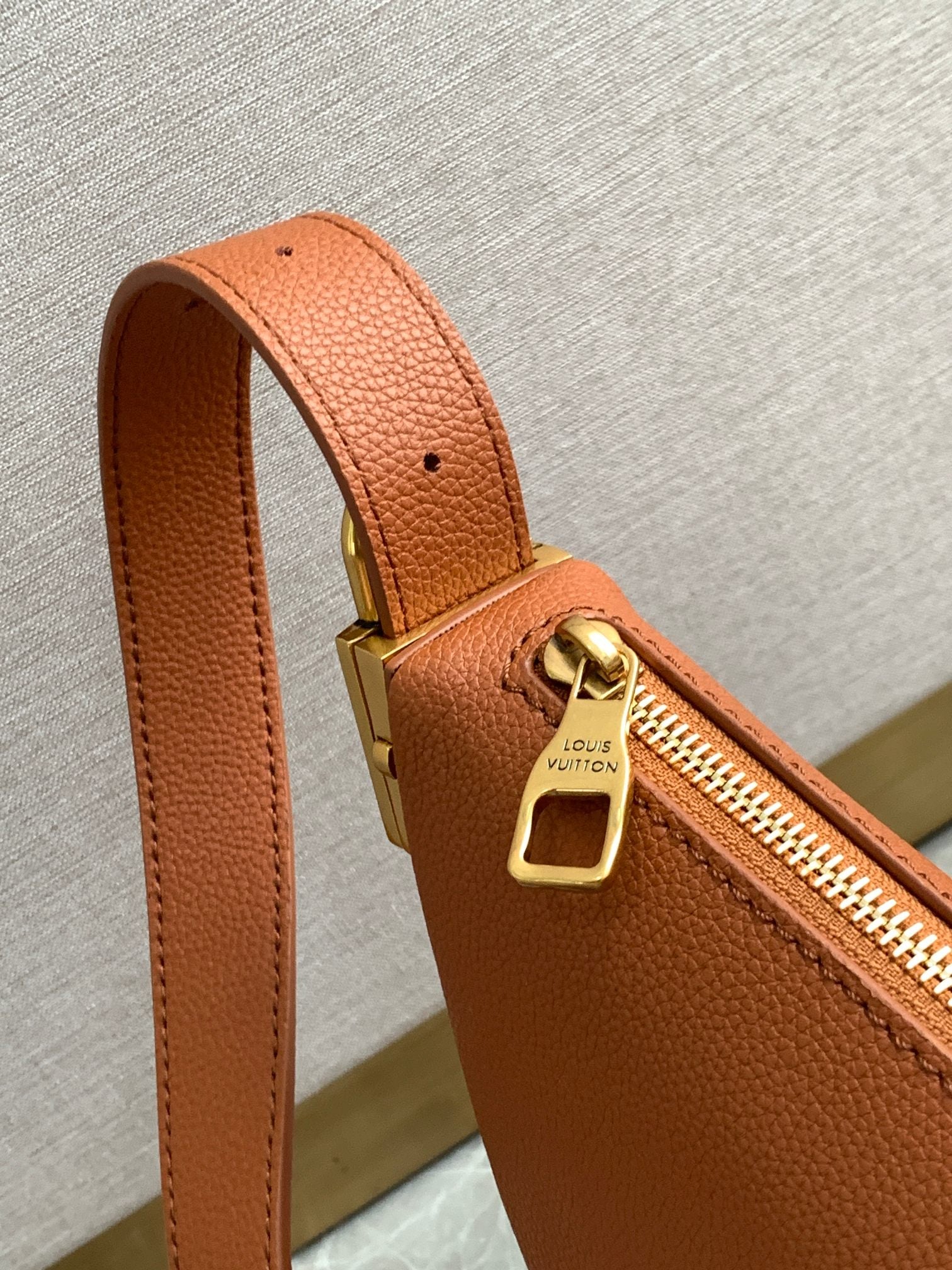 Louis Vuitton Low Key Crossbody Bag | Modern Minimalist Design in Ultra-Soft Calfskin | LV Engraved Padlock & Suede Lining | Adjustable Waist/Shoulder Strap | 28x13x5.5cm Compact Carry