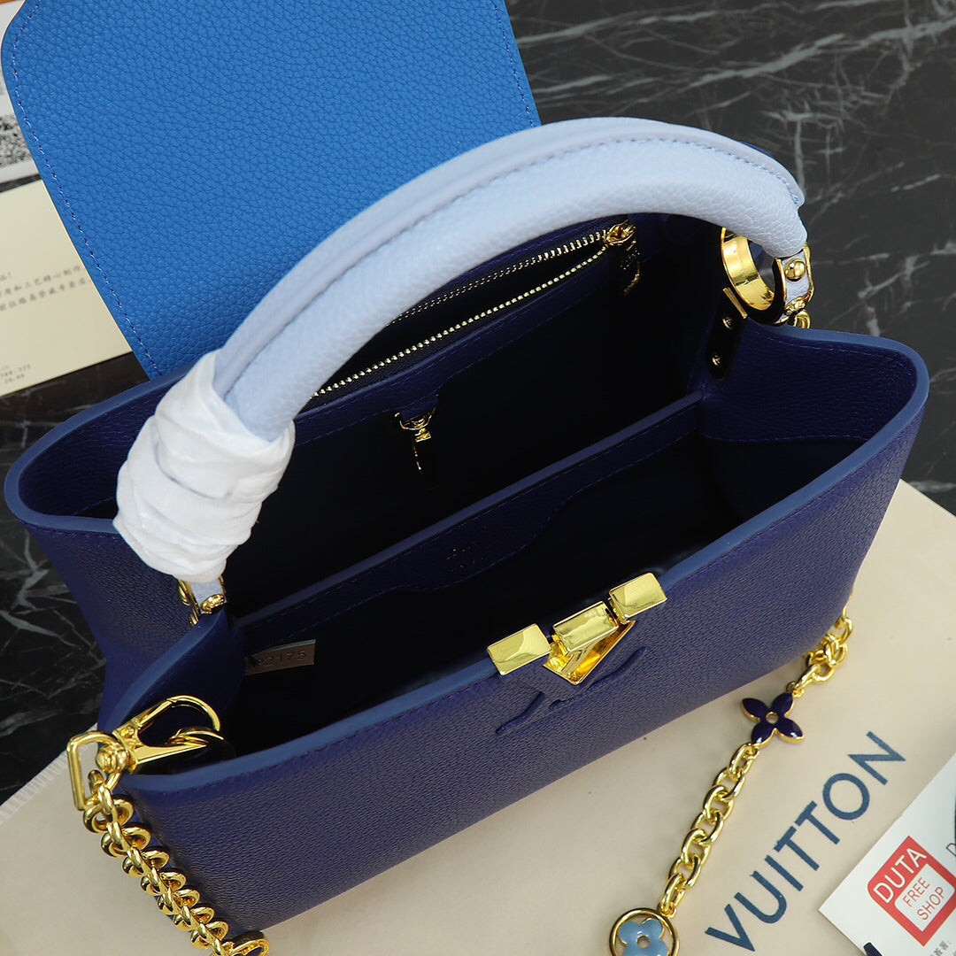 Louis Vuitton Capucines bb Blue Pebbled Leather Bag 27x18x10cm | Celebrity Street Style, Detachable Strap & Twist Lock