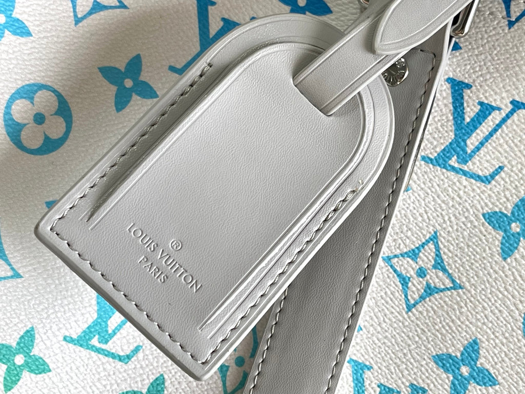 Louis Vuitton KEEPALL BANDOULIÈRE 55 Travel Bag | Vintage Monogram Canvas | FW21-22 Runway Capsule | Storefront Signage Design