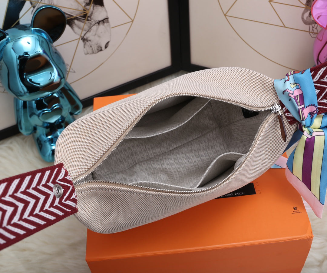 HERMÈS Trousse Bride-A-Brace Pochette | New Colorway with Enamel Bridle Closure | Limited Edition