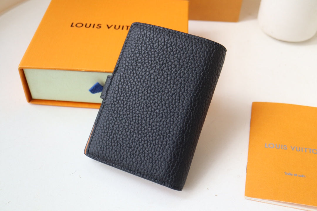 Louis Vuitton LV Vertical Compact Wallet | Grained Taurillon Leather | Capucines-Inspired Slide Lock | Multi-Card Organizer