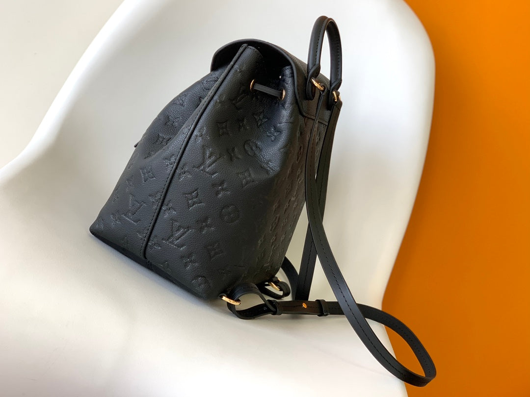 Louis Vuitton Montsouris 1994 Re-Edition Backpack | Monogram Empreinte Embossed Leather | Vintage Metal Buckle | Adjustable Strap
