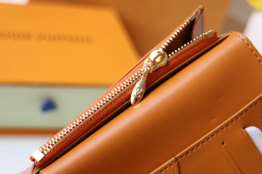 Louis Vuitton LV Vertical Compact Wallet | Grained Taurillon Leather | Capucines-Inspired Slide Lock | Multi-Card Organizer