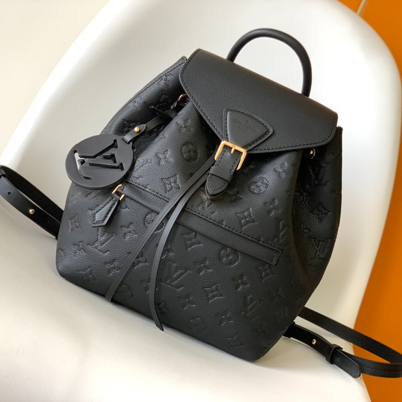 Louis Vuitton Montsouris 1994 Re-Edition Backpack | Monogram Empreinte Embossed Leather | Vintage Metal Buckle | Adjustable Strap
