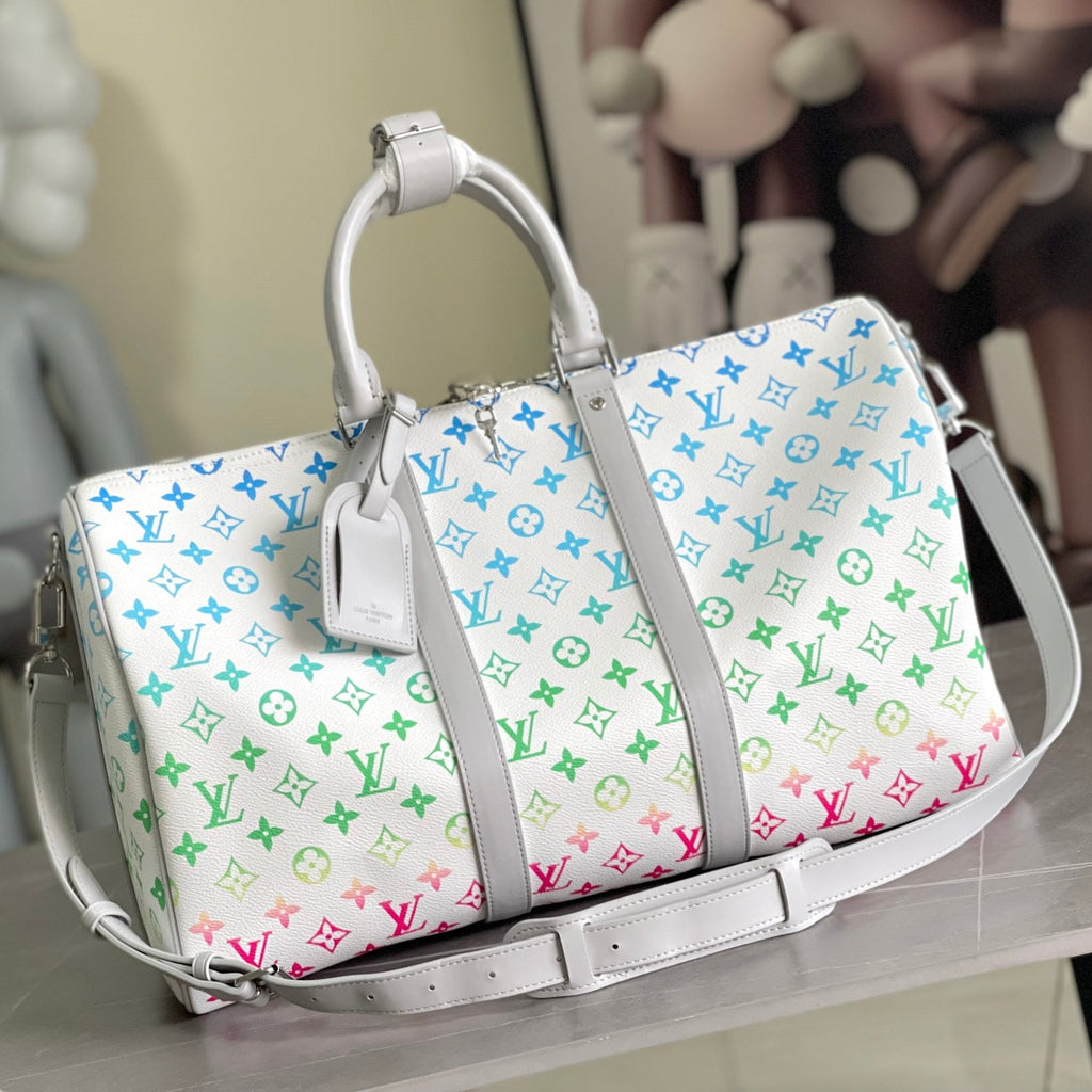 Louis Vuitton KEEPALL BANDOULIÈRE 55 Travel Bag | Vintage Monogram Canvas | FW21-22 Runway Capsule | Storefront Signage Design