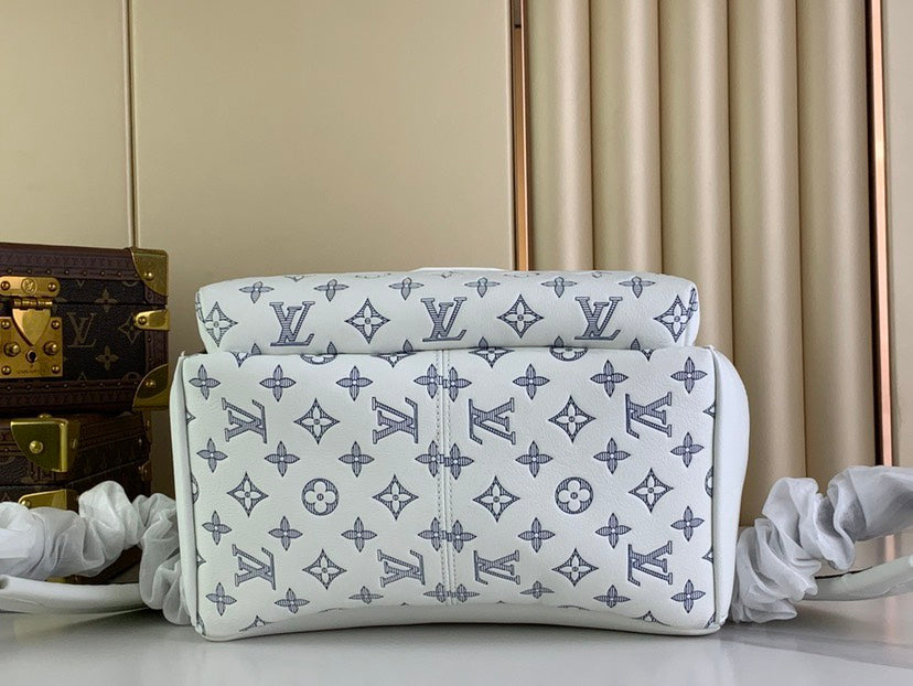 LOUIS VUITTON Discovery Backpack | Navy Blue Monogram Shadow Leather with Embossed LV Initials & Flowers