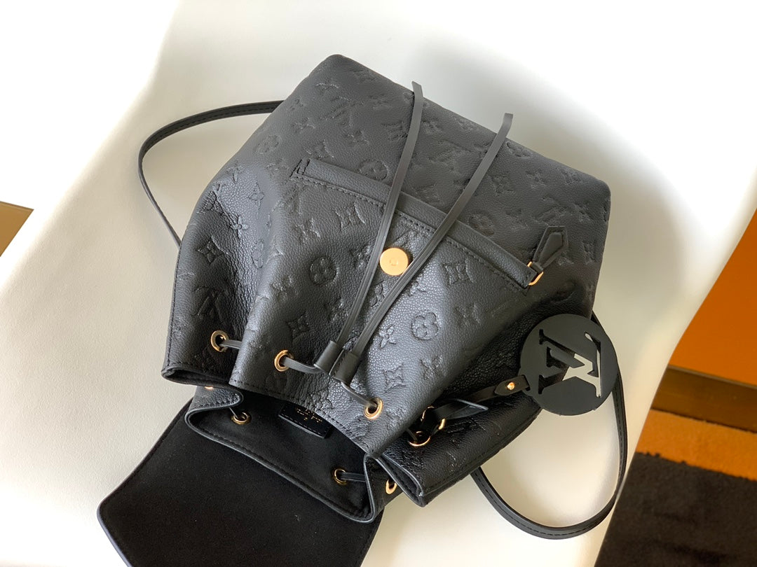 Louis Vuitton Montsouris 1994 Re-Edition Backpack | Monogram Empreinte Embossed Leather | Vintage Metal Buckle | Adjustable Strap