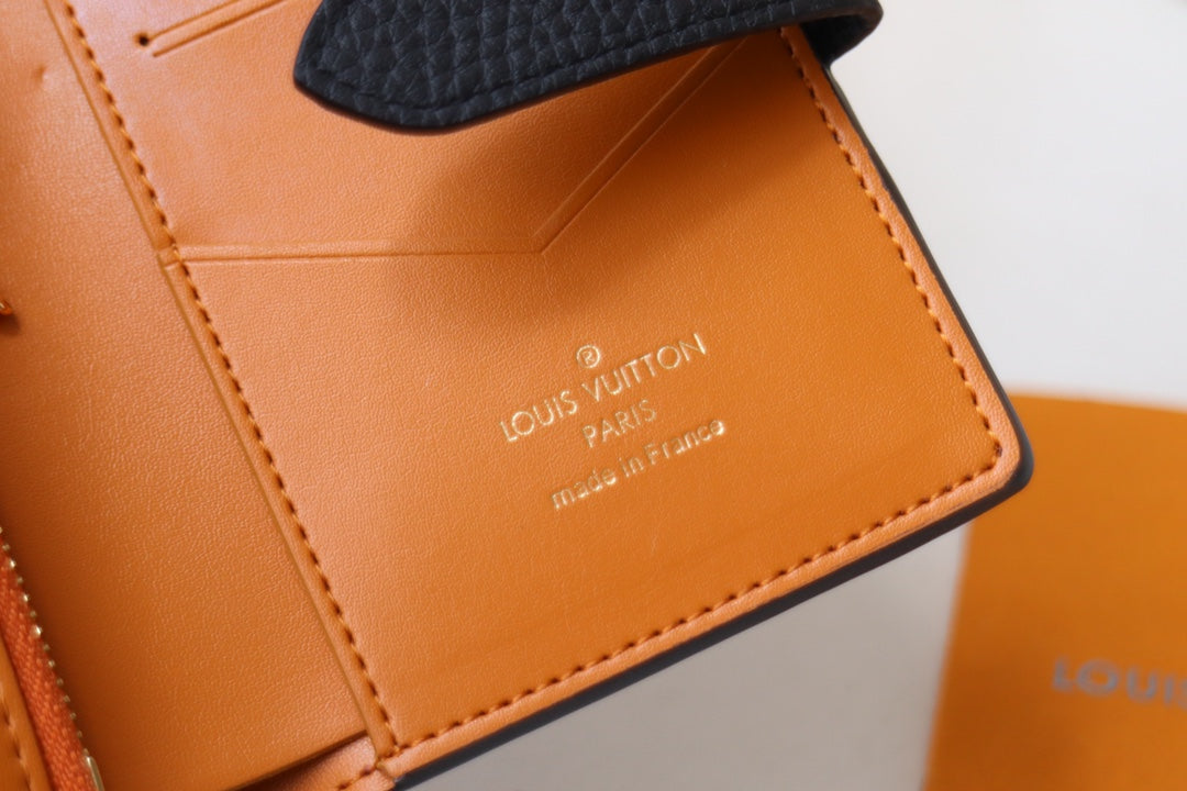 Louis Vuitton LV Vertical Compact Wallet | Grained Taurillon Leather | Capucines-Inspired Slide Lock | Multi-Card Organizer